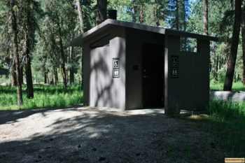 A picture of the vault style outhouse in Abbot Campground