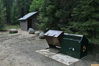A picture of the garbage can and recycling bins at Amanita Campground