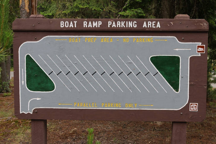 This sign diagrams the layout of the boat launch with parking.
