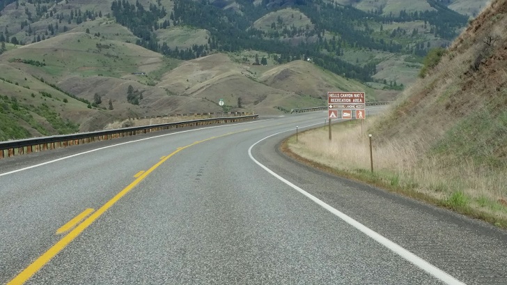 From the north you will see this sign as you are coming around a corner.